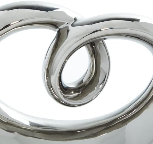 Deco 79 Abstract Ceramic Sculpture with Silver and Black Base