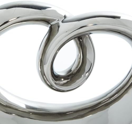 Deco 79 Abstract Ceramic Sculpture with Silver and Black Base